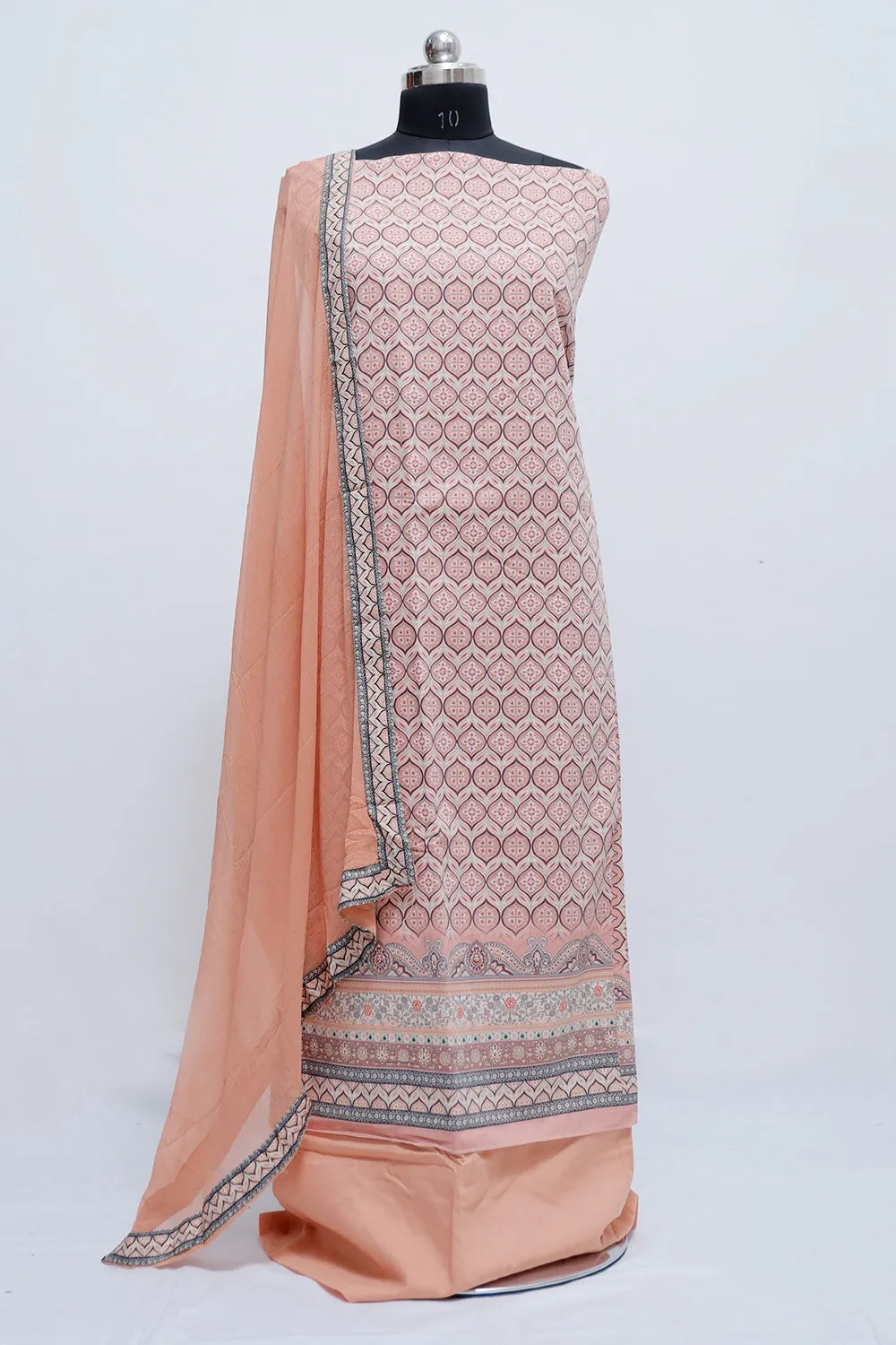 Joyful Peach Colour Beautifully Printed Suit  Known For Its Unique Design & Enhances The Personality Of Wearer.